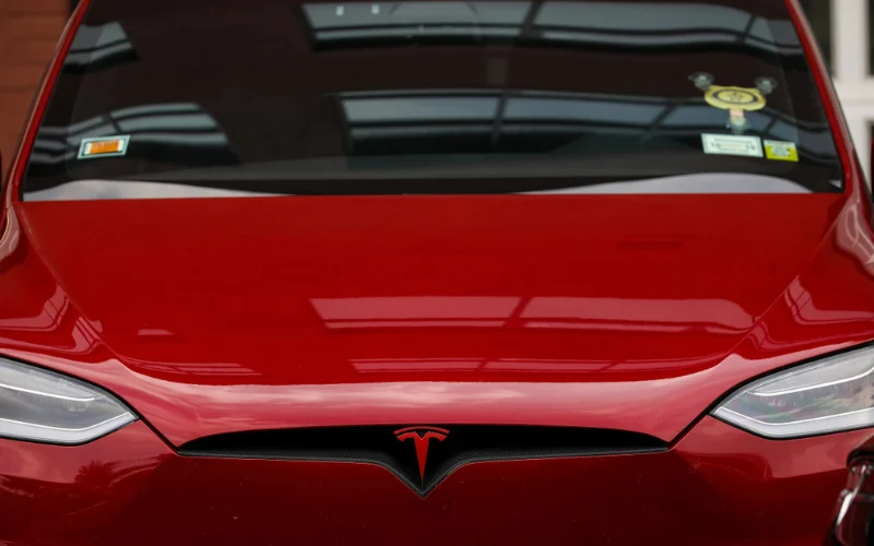 tesla logo meaning