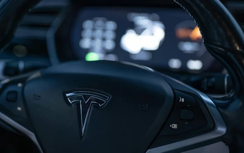 tesla car logo on steering wheel